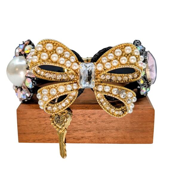 Betsey Johnson Faux Pearl Rhinestone Embellished Bow Hinged Cuff Bracelet - Picture 1 of 7
